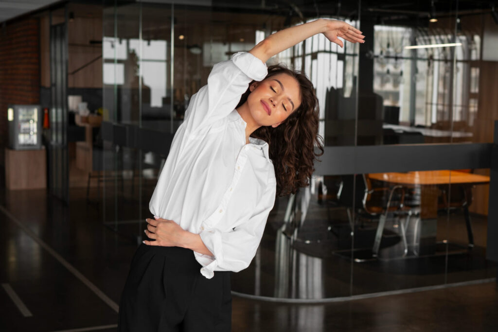 Female Employee Doing Yoga